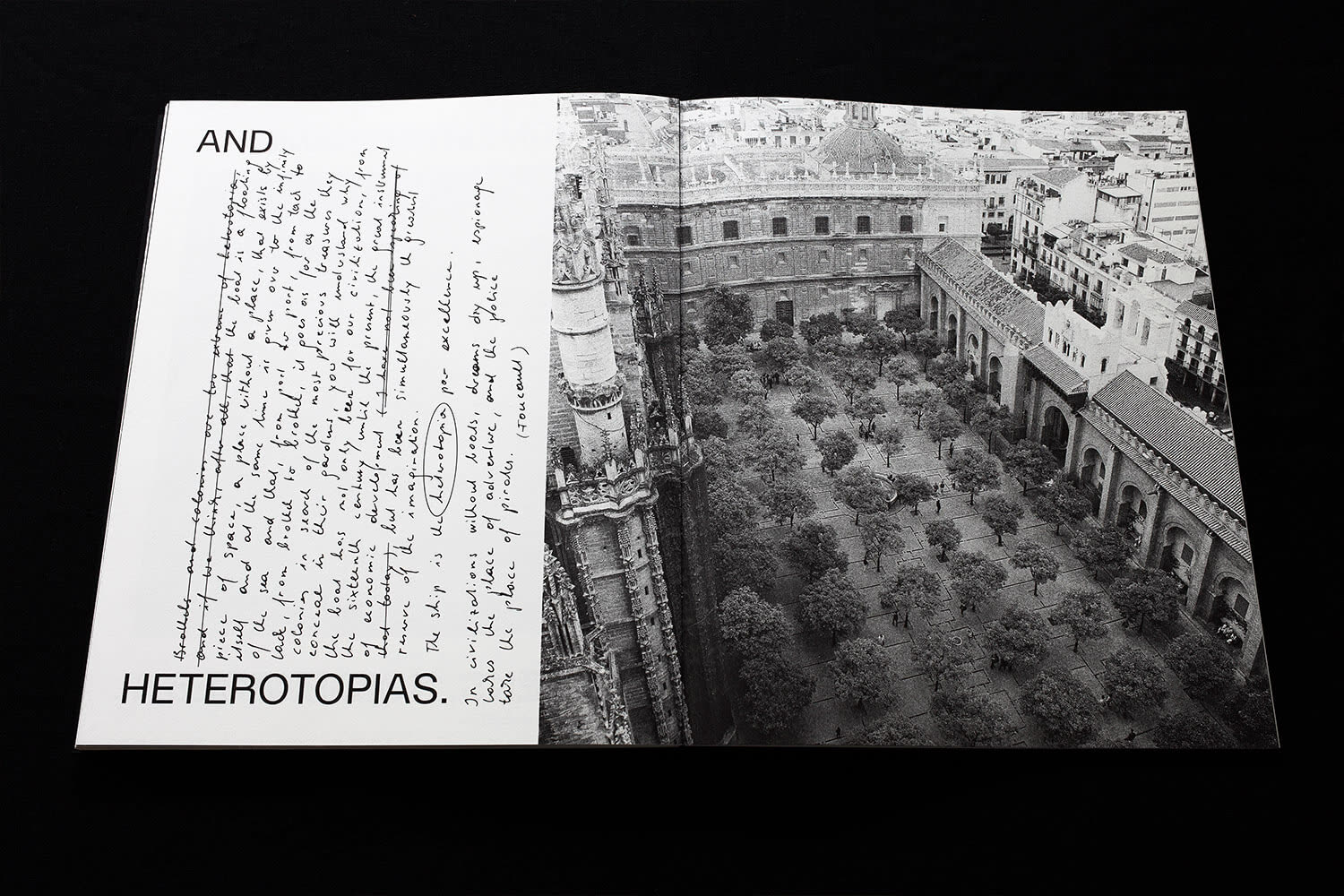 Spread with handwritten notes facing a photograph of a cloister courtyard