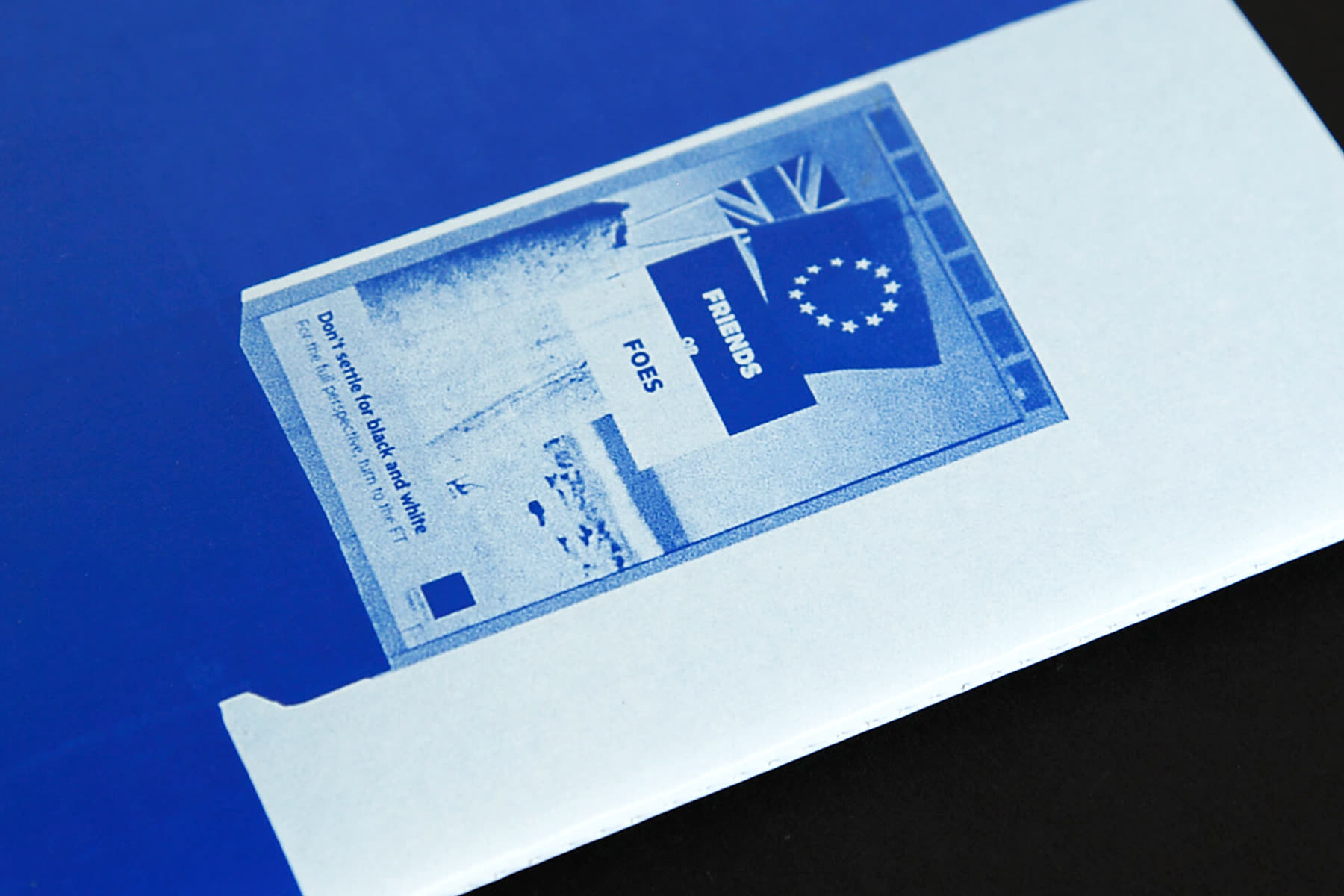 Newspaper detail with the European flag in blue
